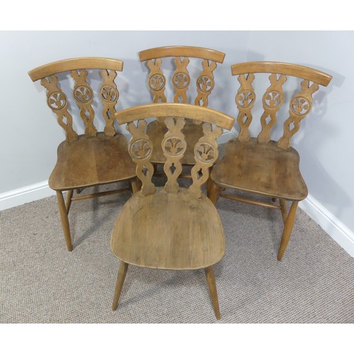 356 - A set of four vintage ash kitchen chairs, all with carved backs, one chair has a different shaped se... 