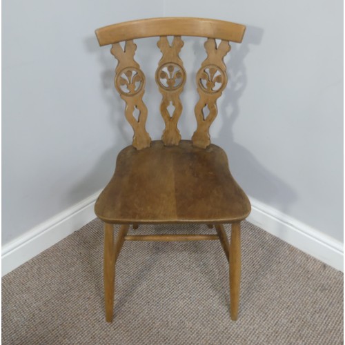 356 - A set of four vintage ash kitchen chairs, all with carved backs, one chair has a different shaped se... 