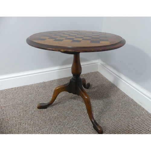 273 - An antique Games Table with a circular top, of small size, raised on tripod base, legs will need res... 