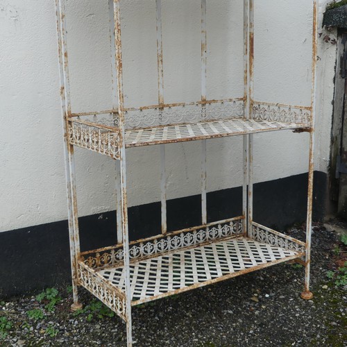 382 - A vintage rustic metal Plant Stand, W 59cm x H 164cm x D 33cm.