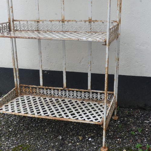 382 - A vintage rustic metal Plant Stand, W 59cm x H 164cm x D 33cm.