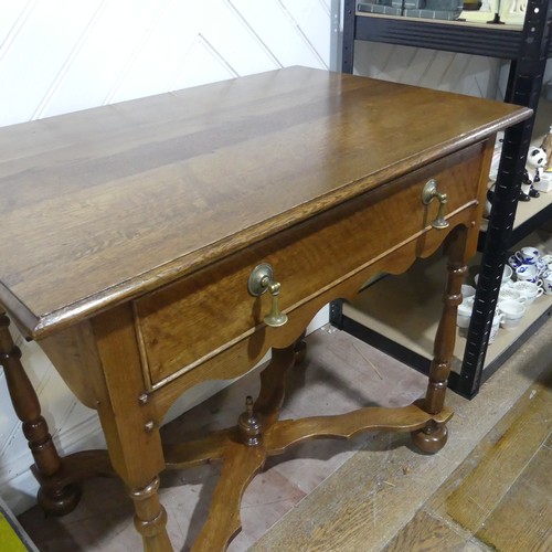 397 - A Queen Anne style oak Side Table, the rectangular top over a singular frieze drawer with tear drop ... 