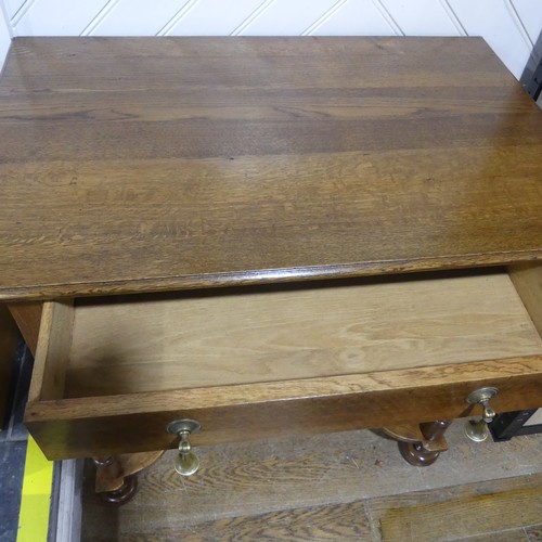 397 - A Queen Anne style oak Side Table, the rectangular top over a singular frieze drawer with tear drop ... 