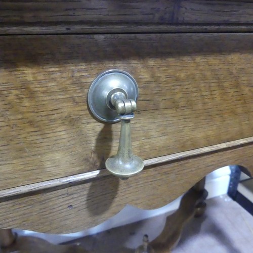 397 - A Queen Anne style oak Side Table, the rectangular top over a singular frieze drawer with tear drop ... 