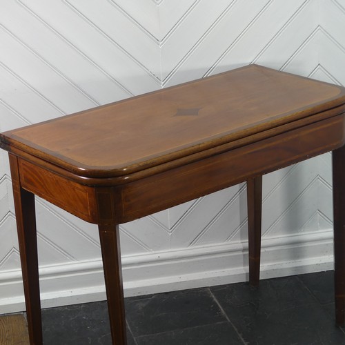 402 - A 19thC inlaid mahogany fold over Card Table, with folding and rotating mechanism set on straight le... 