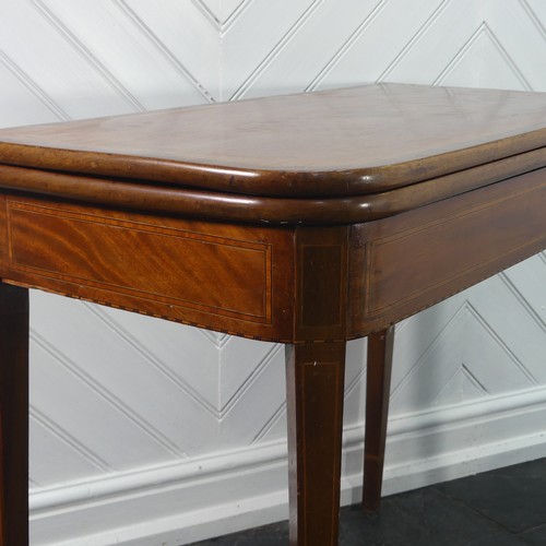 402 - A 19thC inlaid mahogany fold over Card Table, with folding and rotating mechanism set on straight le... 