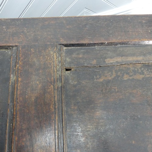 403 - An 18th century oak two-panel Coffer, with carved decoration on front and side panels, W 118cm x H 4... 