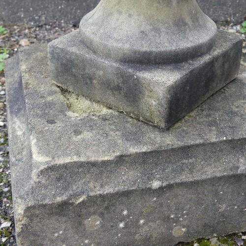 499 - Garden Statuary; a reconstituted stone baluster with associated decorative metal sundial, W 32cm x H... 