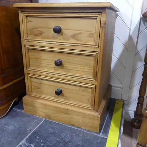 411 - A pine bedside Cabinet, W 47cm x H 61cm x D 39cm.