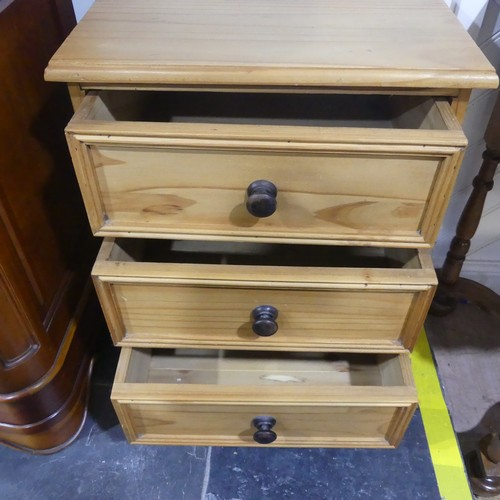 411 - A pine bedside Cabinet, W 47cm x H 61cm x D 39cm.