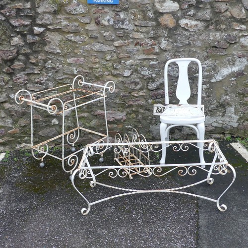 500 - Garden; a white scrollwork metal coffee table frame, lacks top, together with a trolley, rack and sh... 