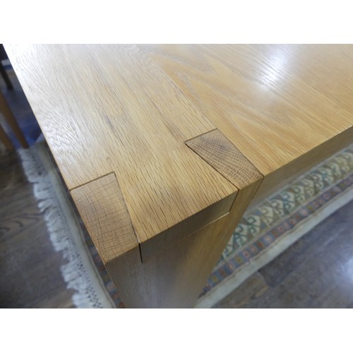 414 - A modern light oak John Lewis Dining Table and six Chairs, featuring dovetail joints, W 231cm x H 76... 