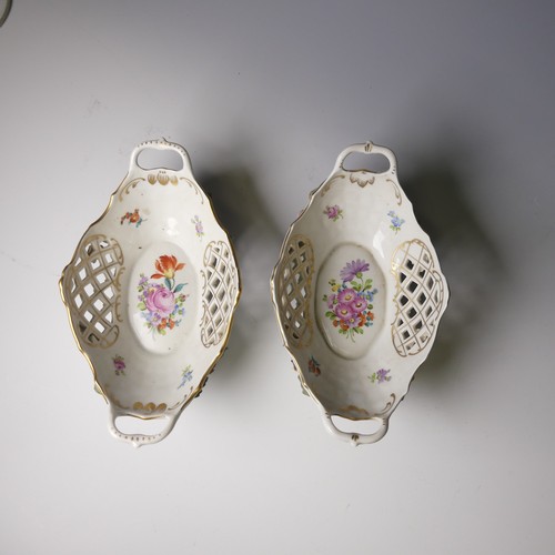 73 - A pair of 20thC Dresden porcelain Baskets, with pierced decorated and flora in relief, factory marks... 