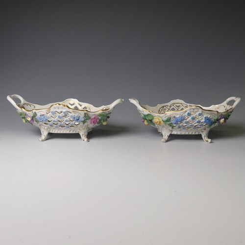 73 - A pair of 20thC Dresden porcelain Baskets, with pierced decorated and flora in relief, factory marks... 