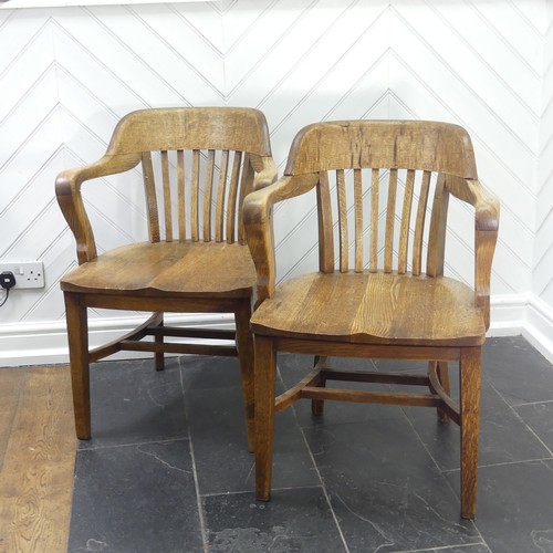 419 - A pair of early 20thC oak Desk Chairs, each W 59cm x H 82cm x D 57cm (2)