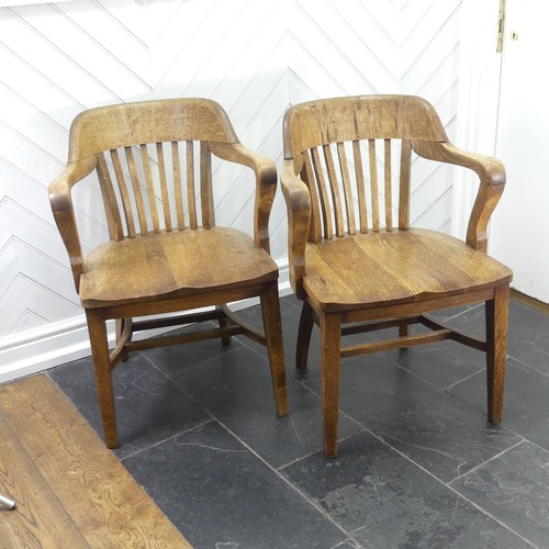 419 - A pair of early 20thC oak Desk Chairs, each W 59cm x H 82cm x D 57cm (2)