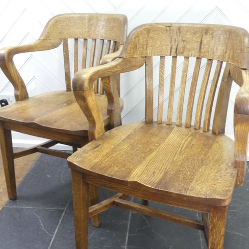 419 - A pair of early 20thC oak Desk Chairs, each W 59cm x H 82cm x D 57cm (2)