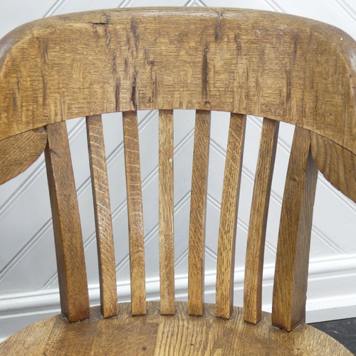 419 - A pair of early 20thC oak Desk Chairs, each W 59cm x H 82cm x D 57cm (2)