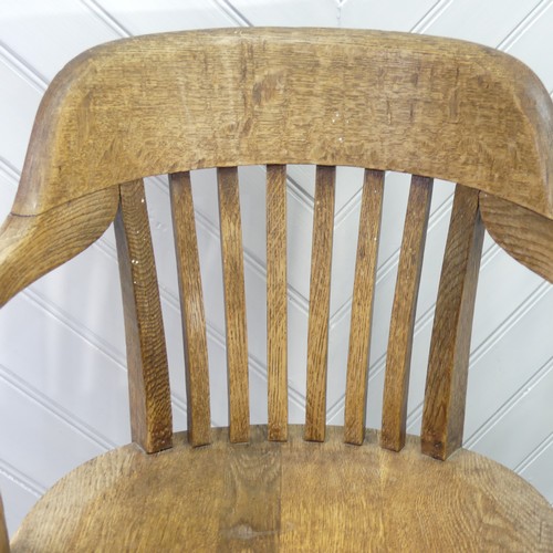 419 - A pair of early 20thC oak Desk Chairs, each W 59cm x H 82cm x D 57cm (2)