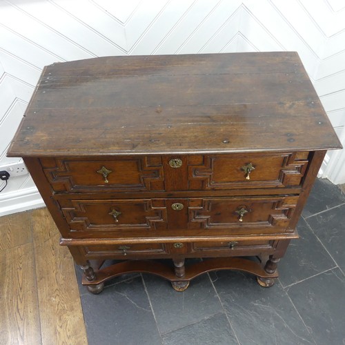 422 - A Carolean style oak Chest-on-Stand, W 92cm x H 94.5cm x D 50.5cm, ball feet damaged.... 