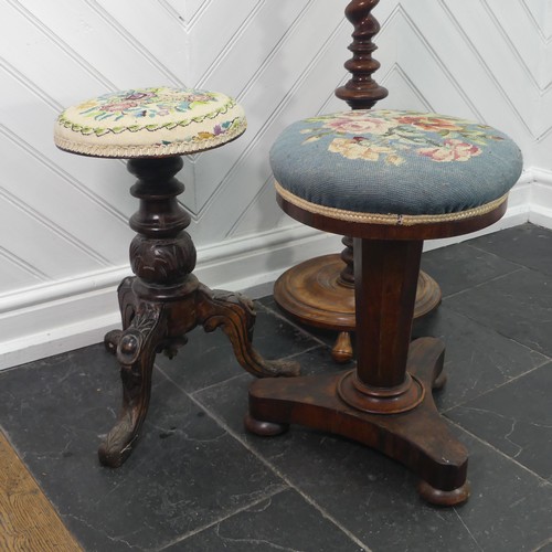 444 - Two Victorian Piano Stools, with adjustable floral tapestry seats set on tripod bases, together with... 