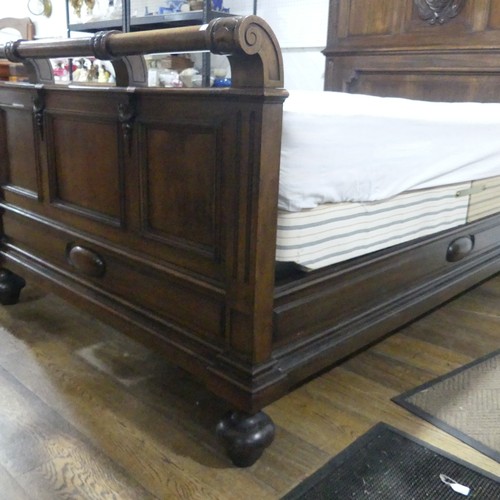 446 - A early 20thC walnut complete Half Tester Bed, with carved panelled headboard and base board, Headbo... 