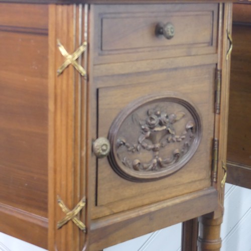 447 - A pair of Louis XVI style kingwood Pot Cupboards, with marble tops and single frieze drawers above c... 