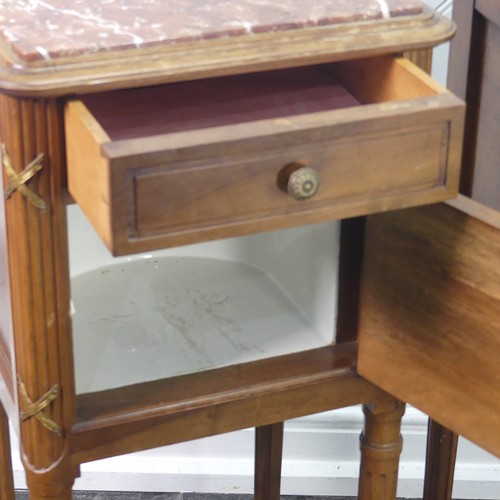 447 - A pair of Louis XVI style kingwood Pot Cupboards, with marble tops and single frieze drawers above c... 