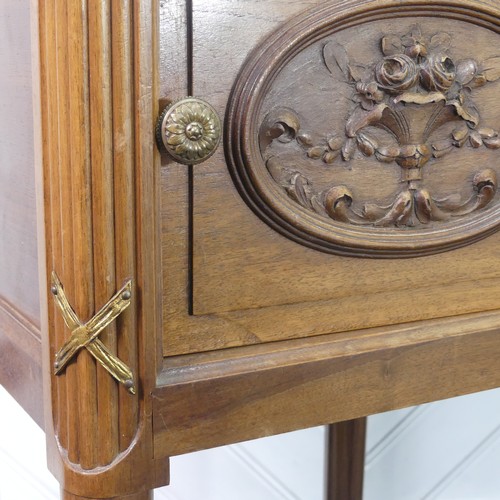 447 - A pair of Louis XVI style kingwood Pot Cupboards, with marble tops and single frieze drawers above c... 