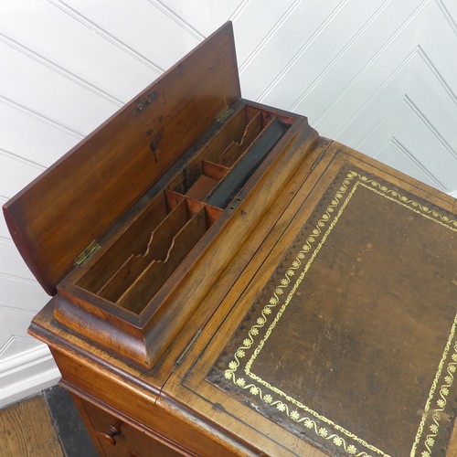 448 - A early 20thC Victorian walnut Davenport,  with fitted stationery compartment, and fitted interior, ... 