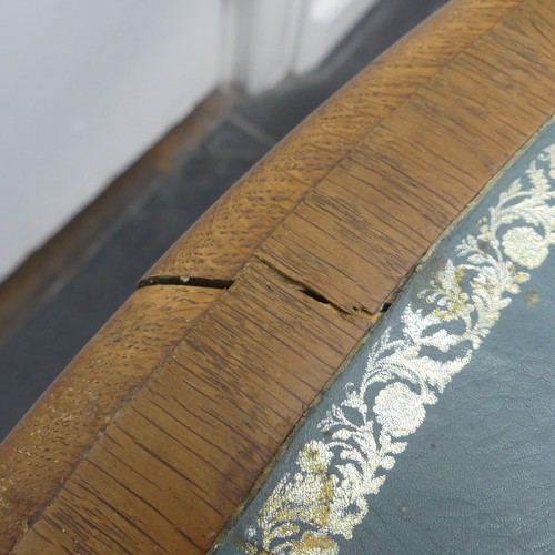 450 - A early 20thC Victorian oak Drum Table, the circular top with a tooled leather writing surface over ... 