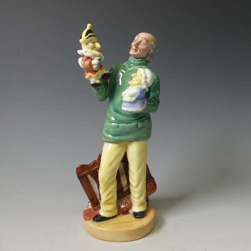 92 - A Royal Doulton Character figure of Punch and Judy Man, HN2765, together with Town Crier, HN2119, Go... 