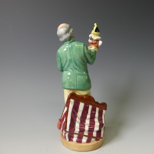 92 - A Royal Doulton Character figure of Punch and Judy Man, HN2765, together with Town Crier, HN2119, Go... 