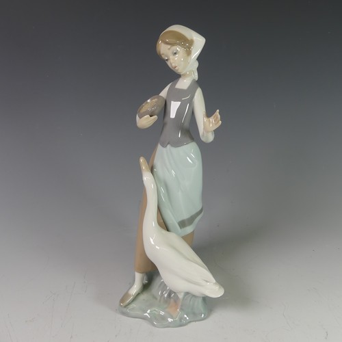 106 - A small quantity of Lladro Figures, to comprise Goose Girl, Young Girl Carrying Basket, Seated Clown... 