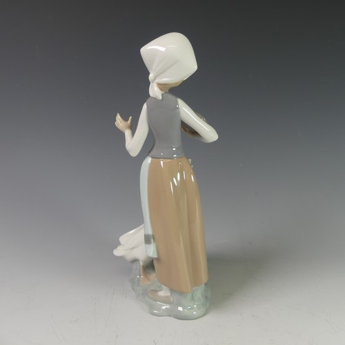 106 - A small quantity of Lladro Figures, to comprise Goose Girl, Young Girl Carrying Basket, Seated Clown... 