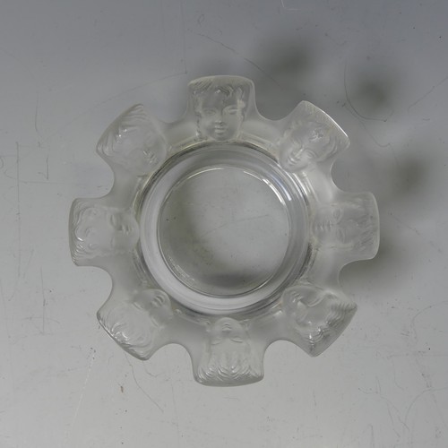 122 - A Lalique glass Ashtray, modelled with eight faces between cigarette rests, with etched signature to... 