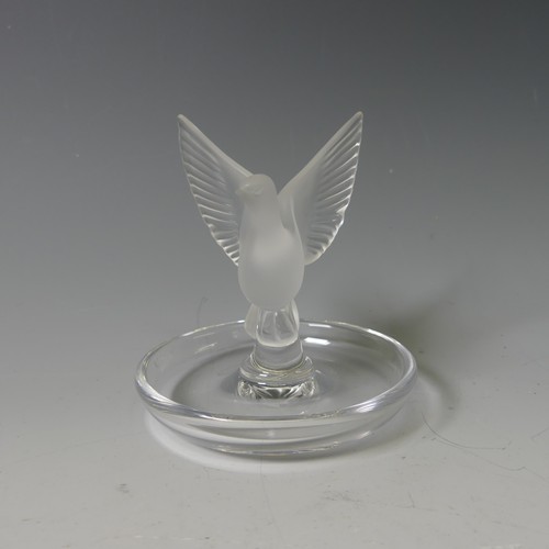 123 - A Lalique glass Pintray, with central frosted glass mascot modelled as a Dove, with etched signature... 