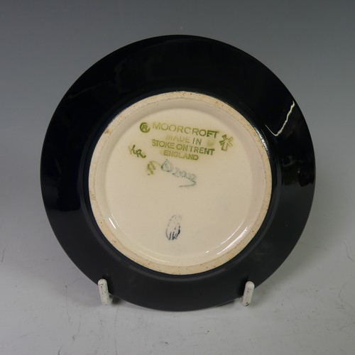 126 - A Moorcroft Anemone Tribute Pin Dish, 12cm diameter, boxed and with card outer sleeve, and a small a... 