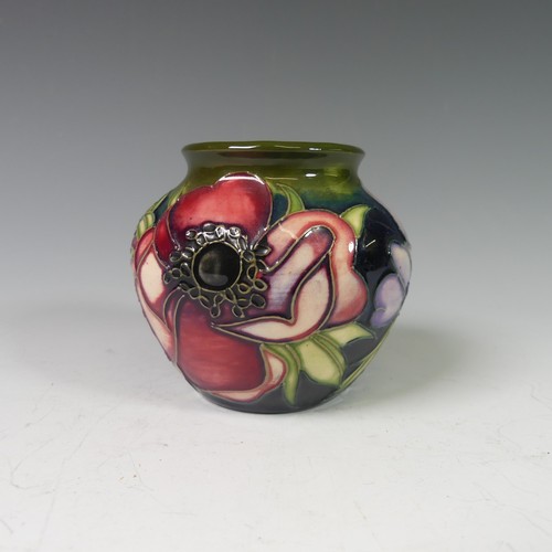 126 - A Moorcroft Anemone Tribute Pin Dish, 12cm diameter, boxed and with card outer sleeve, and a small a... 