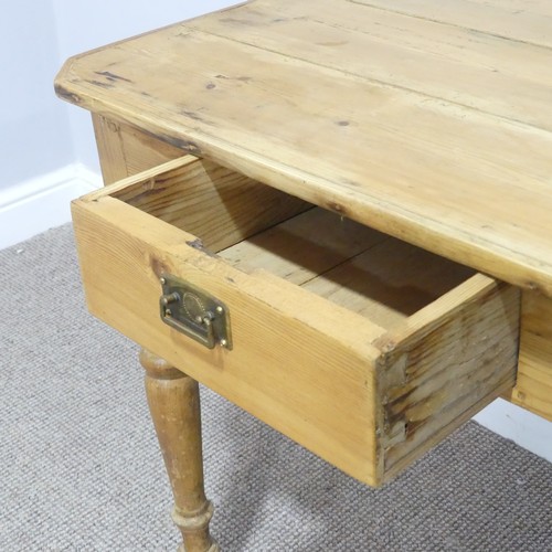 364 - A pine Side Table, the rectangular top above a central frieze drawer, raised on turned legs, W 72cm ... 