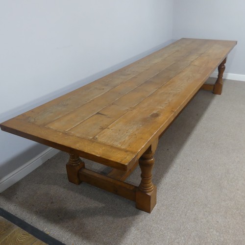 373 - An Early 20thC oak refectory Dining Table, large rectangular four plank top with cleated ends, suppo... 