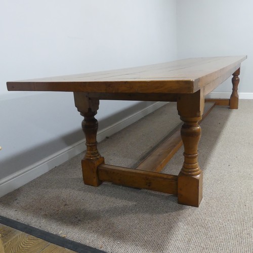 373 - An Early 20thC oak refectory Dining Table, large rectangular four plank top with cleated ends, suppo... 