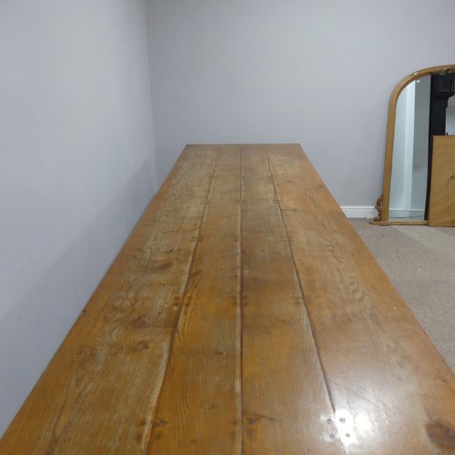 373 - An Early 20thC oak refectory Dining Table, large rectangular four plank top with cleated ends, suppo... 