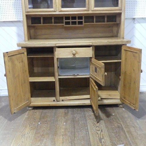 371 - An Early 20thC glazed pine Dresser, with ceramic spice draws, W 137cm x H 173cm x D 55.5cm.... 