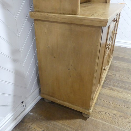 371 - An Early 20thC glazed pine Dresser, with ceramic spice draws, W 137cm x H 173cm x D 55.5cm.... 