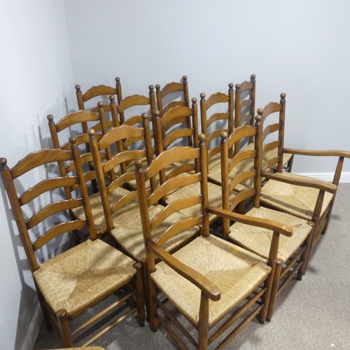 374 - A set of twelve early 20thC oak ladder-back Dining Chairs, made up of two carver chairs with elbow r... 