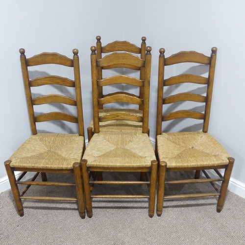 374 - A set of twelve early 20thC oak ladder-back Dining Chairs, made up of two carver chairs with elbow r... 