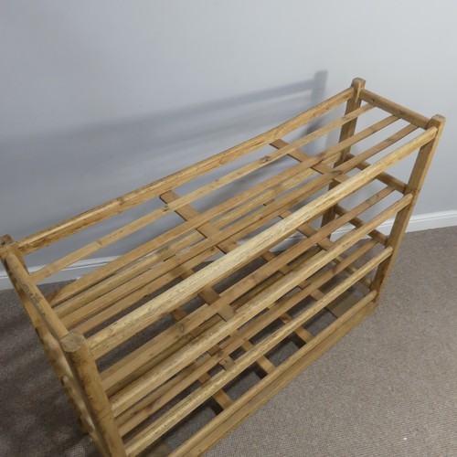 369 - An early 20thC pine Bread Rack, top beam is split and will need refurbishing, W 140cm x H 105cm x D ... 