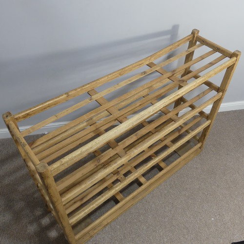 369 - An early 20thC pine Bread Rack, top beam is split and will need refurbishing, W 140cm x H 105cm x D ... 