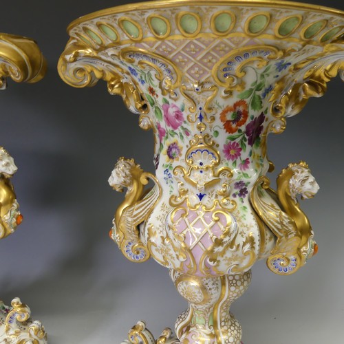 124 - A good pair of late 19thC ornate continental porcelain Vases, probably French, of two-handled oval f... 